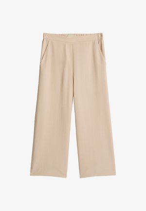 Beżowe spodnie o szerokich nogawkach z elastycznym paskiem i bocznymi kieszeniami, wykonane z gładkiego, lekkiego materiału.