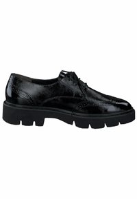 Scarpe stringate in pelle nera con finitura lucida, dettagli brogue e suola in gomma chunky. Presentano una texture liscia e una punta arrotondata.