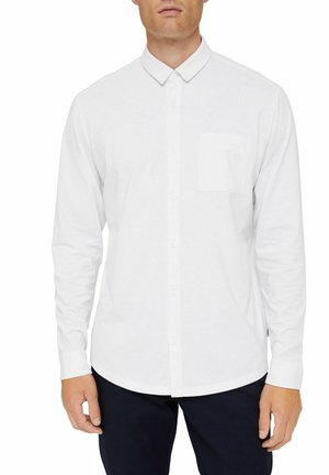 White long-sleeve button-up shirt with a collar, single chest pocket, and a regular fit. Smooth texture with a clean design.