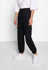 Urban Classics - LADIES VISCOSE TWILL CARGO PANTS - Trousers - black Thumbnail Image 1