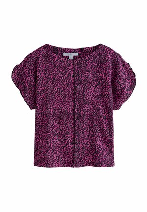 Kurzen Ärmeloberteil in lebhaftem Pink mit einem schwarzen Leopardenmuster. Leichter Stoff mit lockerer Passform und runder Halslinie.