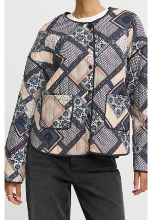 Välikausitakki - blue