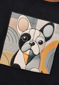 Black T-shirt featuring a textured patch with a stylized French bulldog in muted colors, surrounded by geometric patterns and lines.