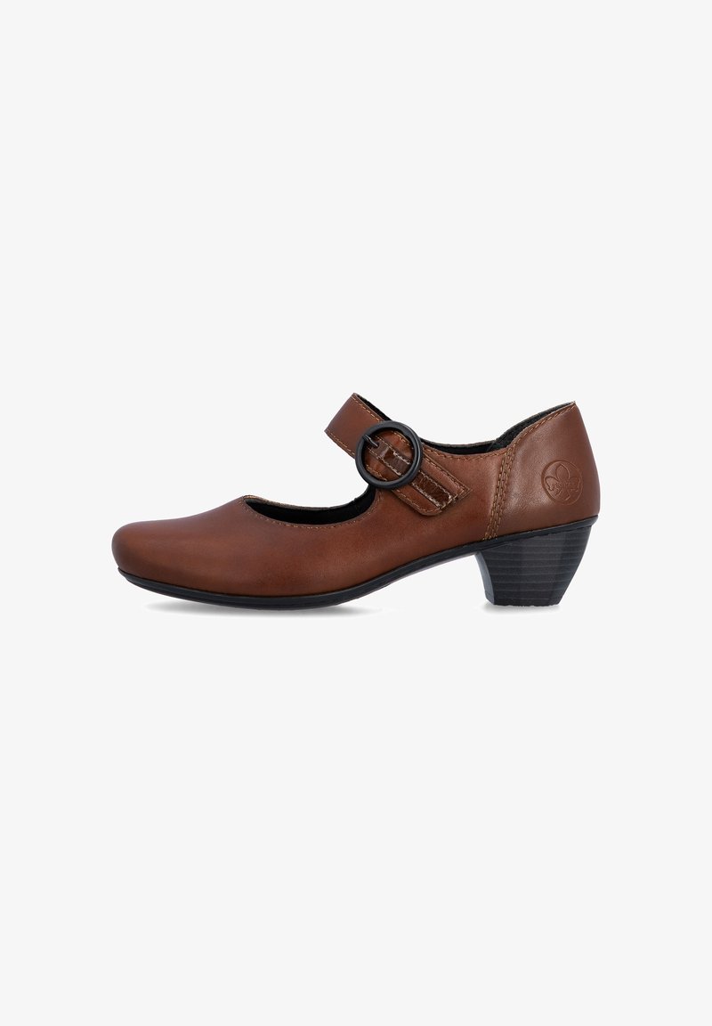 Chaussure Mary Jane en cuir marron avec un petit talon épais et une bride ajustable fixée par une boucle ronde noire.