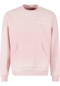 Felpa rosa in cotone, con collo a giro, maniche lunghe, polsini a coste, tasca a marsupio e un piccolo logo sul petto.