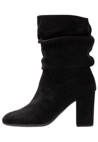 Unisa Stivaletti - black