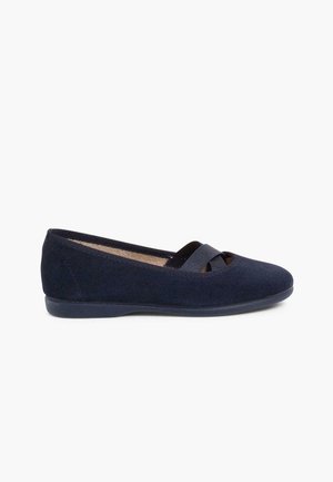 Navy blue suede ballet flats with a rounded toe, satin strap across the front, and a flat rubber sole. Smooth texture with no notable patterns.