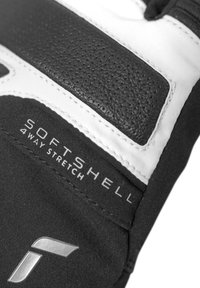 Guanto softshell nero con accenti bianchi, pannello in pelle nera strutturata e etichetta "SOFTSHELL 4 WAY STRETCH". Include dettaglio del logo argentato.