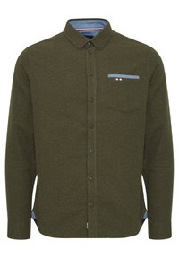 Olivenfarget langermet skjorte i strukturert stoff, med krage med knapper, brystlomme og denimdetaljer på lommen og kanten.