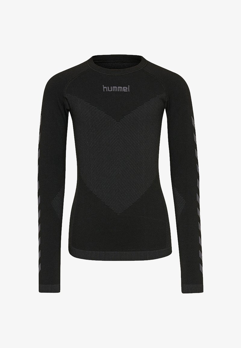 Black long-sleeve athletic shirt with textured chevron pattern on front and reflective chevrons along sleeves, "hummel" logo on chest.