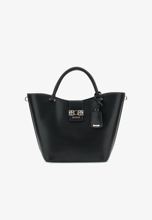 Bolso de mano sintético negro con forma estructurada, doble asas, un acento de logo en metal plateado y una etiqueta desmontable. Textura suave.