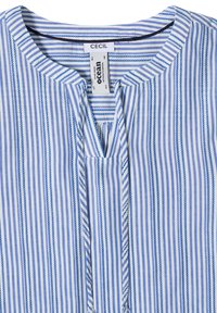 Chemise rayée verticale bleue et blanche avec encolure ronde et fente centrale devant, affichant les étiquettes de marque « Cecil » et « Ocean ».