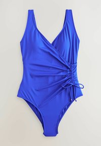 Blauwe eendelige zwemkleding gemaakt van gladde stof. Heeft een wikkelontwerp, verstelbare zijruche en een gestrikt accent.
