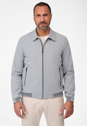 Gray bomber jacket with a zip closure, side zip pockets, textured cuffs, and hem detailing. Smooth fabric finish, relaxed fit.