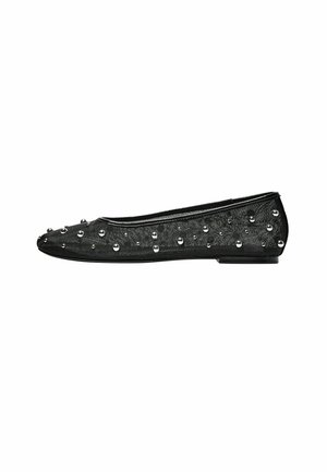 Black flat shoe with a pointed toe, textured fabric, and embellished with silver beads along the upper for detailing and contrast.