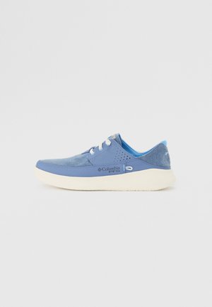 Blue fabric sneaker with white rubber sole, round toe, and perforated accents. Features flat laces and branding on the side.