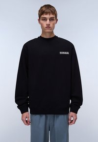 Black sweatshirt made of cotton with a crew neck, long sleeves, and a small logo on the chest. Smooth texture and ribbed cuffs and hem.