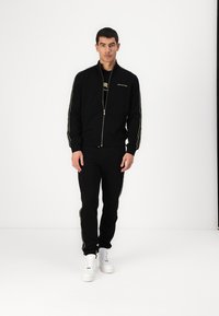 KARL LAGERFELD Felpa con zip - black