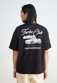 Puma - - T-shirt z nadrukiem Miniatura obrazu 1