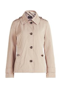 Veste femme beige clair boutonnée avec col, épaulettes et deux poches avant, présentée sur fond blanc.