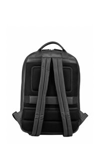 Sac à dos noir avec panneaux en maille, bretelles rembourrées et poignée supérieure. Présente un design épuré et des matériaux texturés.