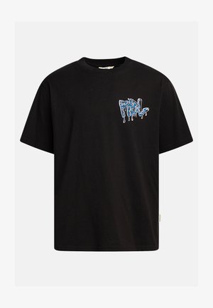 T-shirt en coton noir à coupe ample, avec un texte graphique bleu dégoulinant sur le devant. Manches courtes et col rond.
