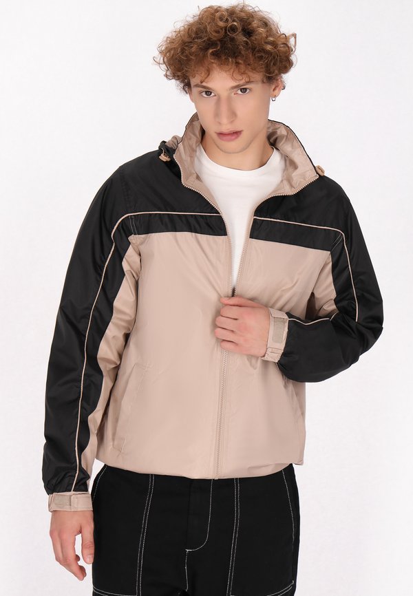 Trainingsjacke - beige schwarz