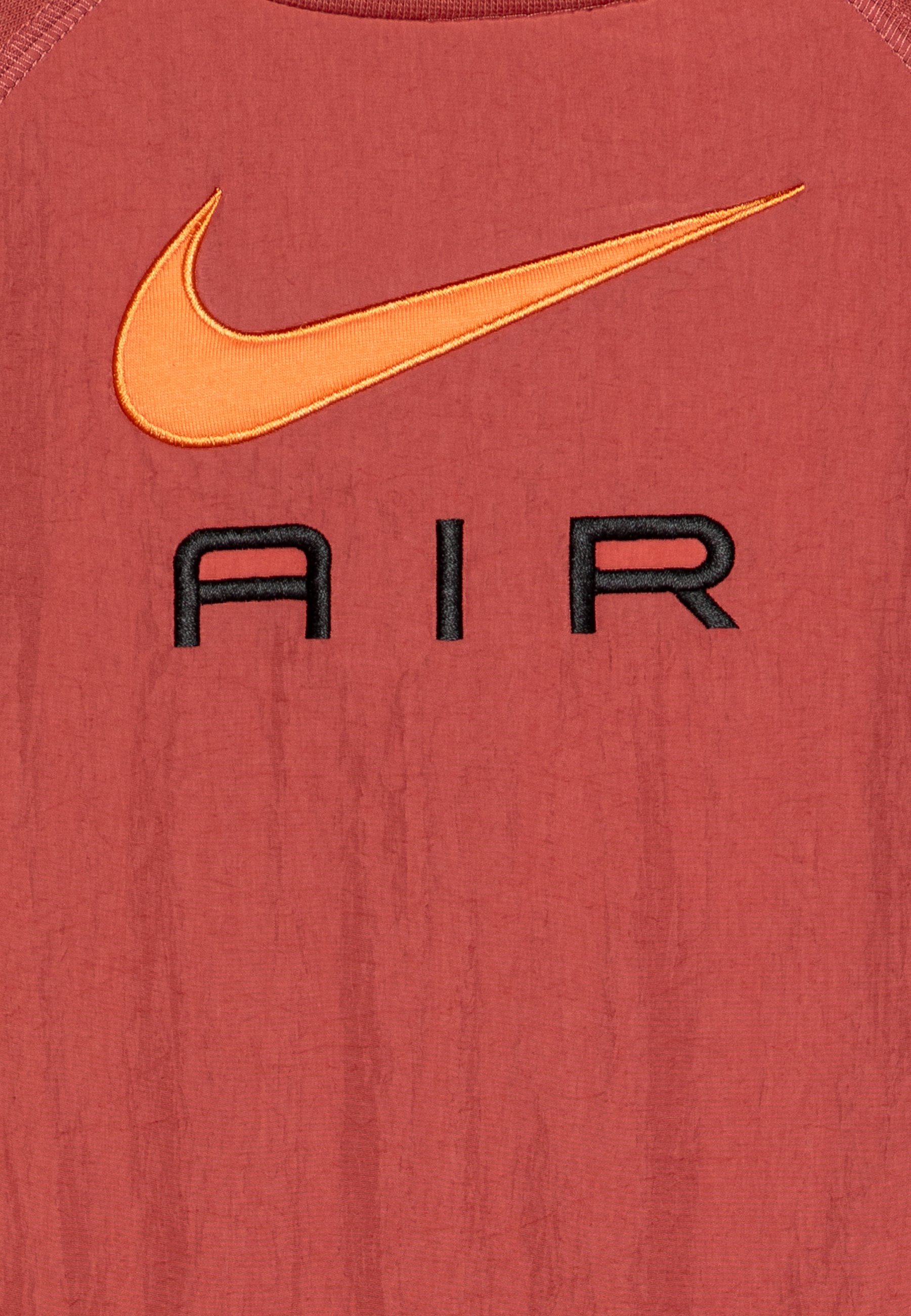 canyon rust nike shirt