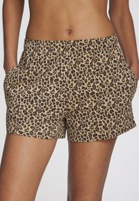 Luipaardprint korte broeken in lichtbruin en zwart, met een elastische tailleband en zijzakken. Zachte stof met een ontspannen pasvorm.