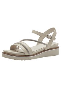 Sandali con zeppa beige con molte cinghie incrociate, dettagli in accento argento, soletta imbottita e suola in gomma testurizzata per una buona presa.