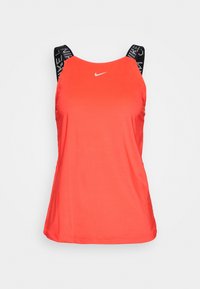 Débardeur de sport rouge avec bretelles à motifs noirs, doté d'un col rond et d'un logo à l'avant. Texture lisse et coupe ajustée.