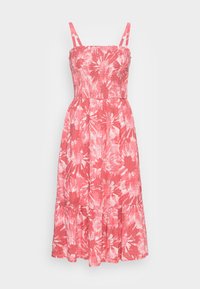 Robe rose sans manches avec un motif floral, corsage froncé et ourlet à volants en étages. Fabriquée en tissu léger, elle présente des bretelles fines et réglables.