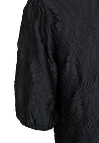 Black textured blouse featuring a wavy pattern with gathered short sleeves. Made from lightweight fabric, it has a relaxed fit and subtle sheen.