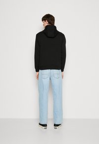 HUGO DARATSCHI - Hoodie - black