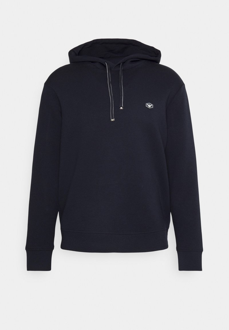 Navy blue hoodie with a drawstring hood, ribbed cuffs, and hem. Features a small logo on the left chest. Made of soft fabric.