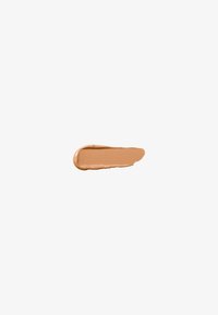 Nestemäinen meikkivoide värinä lämmin beige, sileä rakenne, puolimatta pinta, hieman kiiltävä reuna.