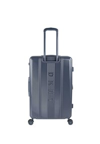 Maleta rígida de color gris oscuro con diseño de surcos verticales, asa retráctil y cuatro ruedas giratorias para una fácil maniobrabilidad.