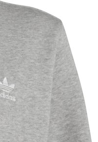 Gray sweatshirt made of soft cotton blend, featuring a white embroidered logo on the left chest and a textured finish.