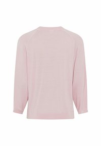Light pink sweater, soft texture, relaxed fit, three-quarter raglan sleeves, rounded neckline, and no visible embellishments or patterns.