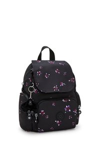 Svart tygryggsäck med blommönster i lila och vitt. Har en framficka, dragkedjestängningar och en nyckelringstillbehör.
