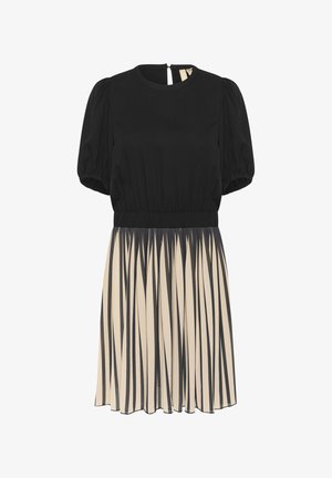 Vestido negro con mangas abullonadas cortas, sección superior lisa, cintura elástica y falda plisada crema con rayas verticales negras.