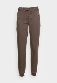 Brown jogger pants featured with a drawstring waist, zippered pockets, and tapered cuffs, set against a plain white background.