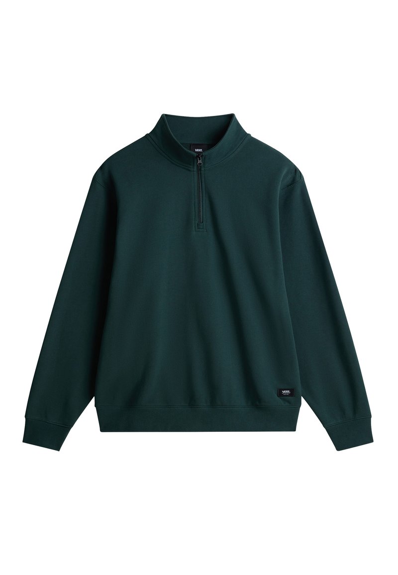 Sudadera de cremallera verde oscuro con un alto cuello, mangas largas, puños acanalados y una pequeña etiqueta de logo en la parte inferior izquierda. Textura suave.