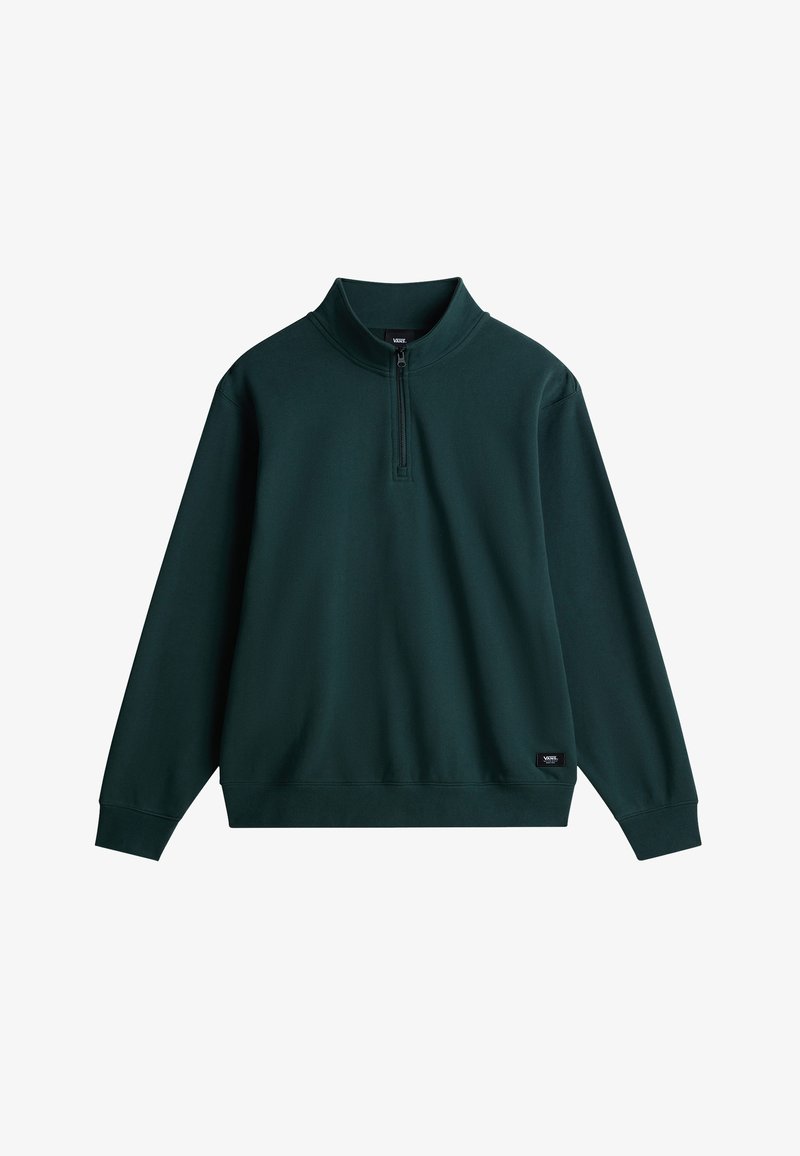 Sudadera de cremallera verde oscuro con un alto cuello, mangas largas, puños acanalados y una pequeña etiqueta de logo en la parte inferior izquierda. Textura suave.