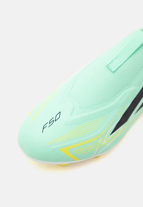 adidas F50 HYPERFAST LEAGUE LACELESS FIRM GROUND KIDS UNISEX - Botines de fútbol para terreno firme - pulse mint/night navy/solar lemon — foto 6
