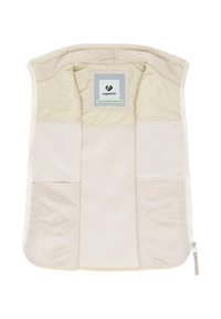 Beige ärmellose Weste mit einem weichen, strukturierten Futter. Das Innenfutter verfügt über mehrere Taschen. Etikett in der Mitte mit dem Markenlogo sichtbar.