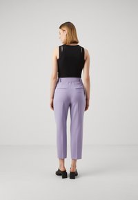 BOSS TAPIAH - Hlače chino - medium purple