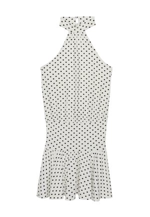 Robe blanche sans manches à col halter avec pois noirs, taille cintrée, encolure goutte d'eau et ourlet à volants.