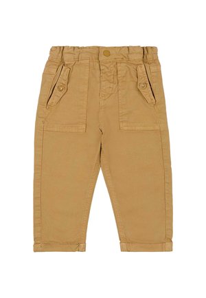 Beige broeken met een elastische tailleband, twee voorzakken en een gladde textuur van katoen. De pijpen zijn aan de onderkant omgeslagen voor een taps toelopende pasvorm.