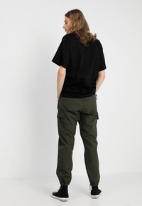 Carhartt WIP JOGGER COLUMBIA - Bojówki